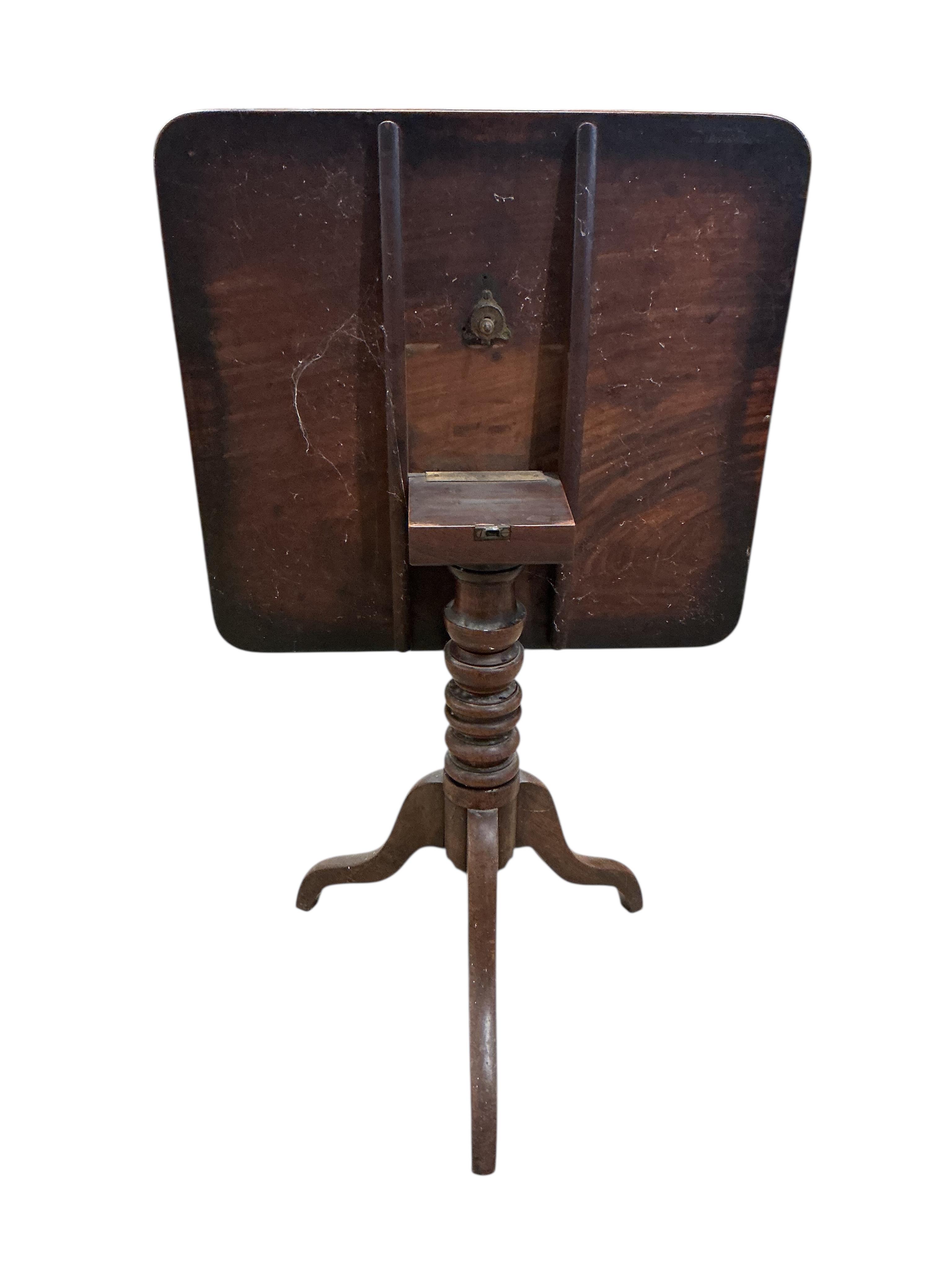 A Regency rectangular mahogany tilt top tripod tea table, width 65cm, depth 60cm, height 74cm